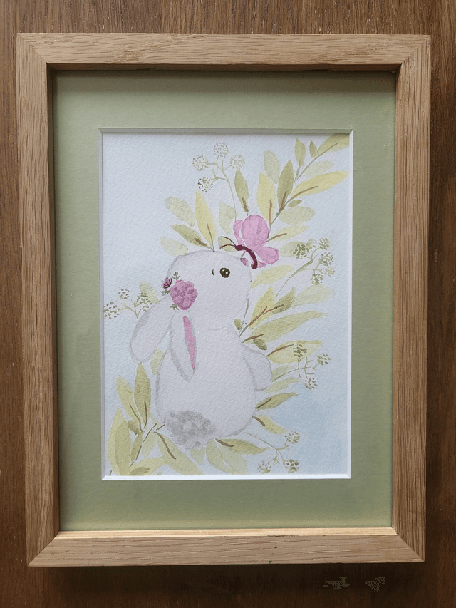 Le lapin et ses jolies fleurs